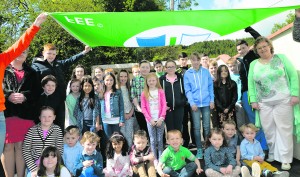 The Green Schools committee with their coordinator Marion Brosnan. G Mol Scoil Naomh Íde Ashford Raise Green Flag