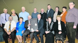 Tom McKenna making a presentation to Donie and Betty Lyons on behalf of West Limerick Singing Club. G Mol West Limerick Singing Club Honour Donie Lyons