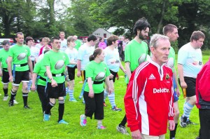 Benny Henry leading out the Mallow Barbarians RFc team for a game against Garrowen last June at Mallow RFC grounds. Pic S Murphy.