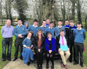 Caption with the photograph reads:  from left: Billy Lee, Ballygowan; Eileen Fitzgerald, BITC; Anita Gallagher, Britvic and Donal Enright, Desmond College with the 5th year students of Desmond College.