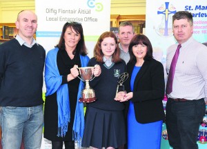 St. Mary's Secondary School Charleville student Erin Queally (centre), who won the Best Display Award at the National Final of the Schools Enterprise Programme at Croke Park last week, pictured with teachers Gerard O'Donovan and Ann Doherty (left), Joan Kelleher, Business Information Officer Local Enterprise Office Mallow, Colm Walsh, Local Enterprise Office Mallow, and P. J. McCarthy, President Charleville Chamber.