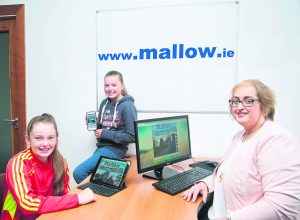 Catherine O'Regan, Mallow Development Partnership, with Tara Bolster and Lucy McDonnell at the launch of the new 'mallow.ie' website. Pic, Sean Jefferies.