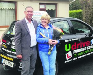 Anne Herlihy pictured with Martin Hennessy of U Drive after her driving lesson last week in Charleville.