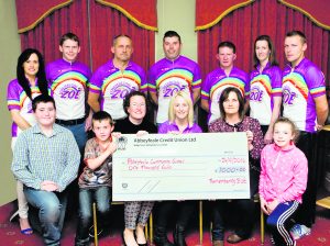 Members of Remembering Zoë committee presenting a cheque 1,000 to Abbeyfeale Community Games. Front: Gearóid Collins, Tiernan Collins, Lee Collins, Alisha Scannell, Noreen Cullinane, Aoife Cullinane. Back: Trish Roche, Michael Lane, John Collins, Shane O'Connor, Tom O'Shaughnessy, Anna O'Sullivan, Eddie Murphy. Paul Ward Remembering Zoe Cheque Presentations