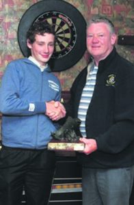 Winner Chris Fehilly of Macroom Trout Anglers receiving the Mark Healy Trophy from Kevin Healy at the All Ireland River Competition in Mallow last weekend.