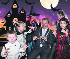 County Mayor Seamus McGrath gets a fright from some scary little friends as he lends his support to the Ghostbusters 5K run/walk in aid of Anchor Treatment Centre which will be held at Doneraile Park at 11.30am this Saturday Oct 29th.